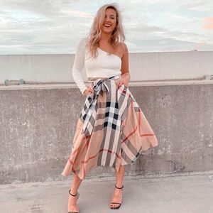 Plaid dress with white off the shoulder one sleeve top